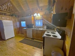 Kitchen Equipped with Stove, Microwave, Refrigerator, Dishwasher, and both regular Coffee Maker and Keurig